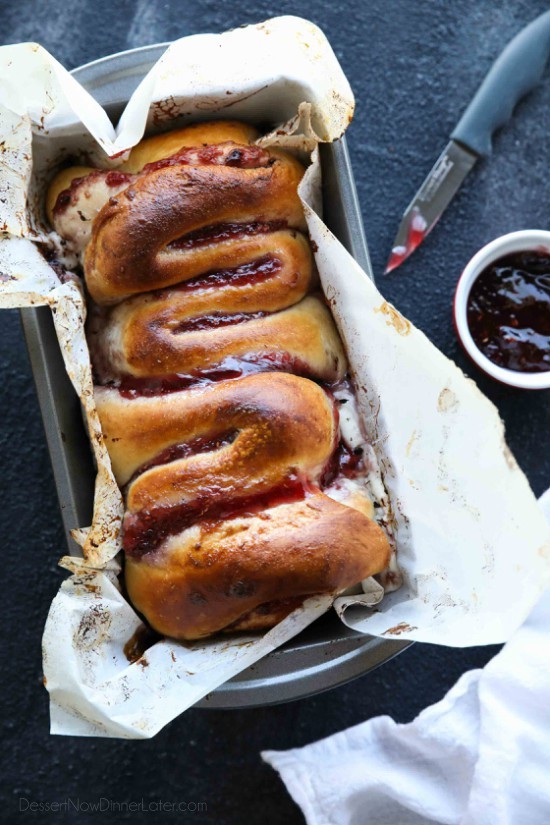 Intestines Bread is a fun halloween party food that makes you look twice. All it really is, is a sweet pull apart bread with cream cheese and raspberries.