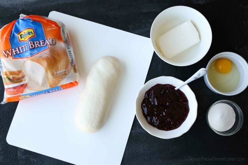 Intestines Bread is a fun halloween party food that makes you look twice. All it really is, is a sweet pull apart bread with cream cheese and raspberries.