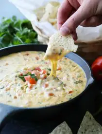 This Queso Dip is classic! Make it mild or hot, chunky or smooth. It's extremely versatile and made with simple ingredients. No Velveeta! A tasty appetizer or snack for game day or any party gathering!