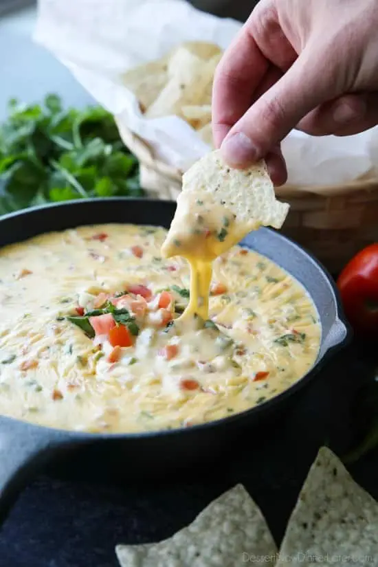 This Queso Dip is classic! Make it mild or hot, chunky or smooth. It's extremely versatile and made with simple ingredients. No Velveeta! A tasty appetizer or snack for game day or any party gathering!