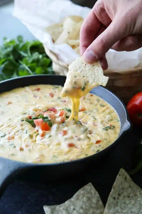 This Queso Dip is classic! Make it mild or hot, chunky or smooth. It's extremely versatile and made with simple ingredients. No Velveeta! A tasty appetizer or snack for game day or any party gathering!