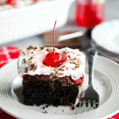 Black Forest Poke Cake is a classic recipe made easy. Plus it serves a crowd! Everyone loves the delicious chocolate-cherry combo in this loaded dessert.