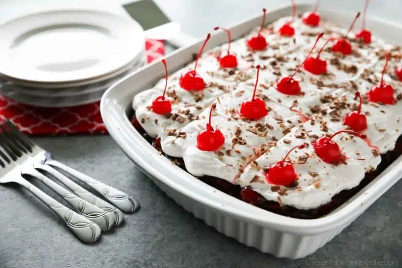 Black Forest Poke Cake is a classic recipe made easy. Plus it serves a crowd! Everyone loves the delicious chocolate-cherry combo in this loaded dessert.