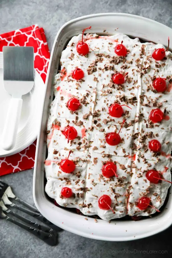 Black Forest Poke Cake is a classic recipe made easy. Plus it serves a crowd! Everyone loves the delicious chocolate-cherry combo in this loaded dessert.