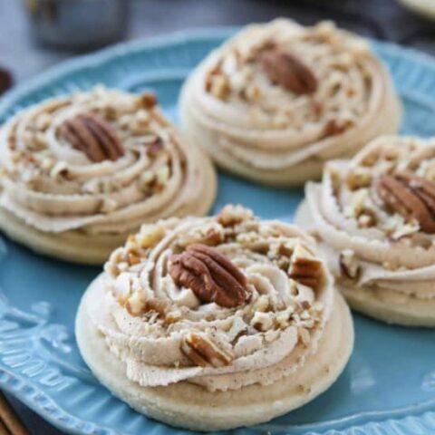 Brown Sugar Pecan Sugar Cookies are made with a classic sugar cookie base and topped with a brown sugar frosting and crunchy toasted pecans.