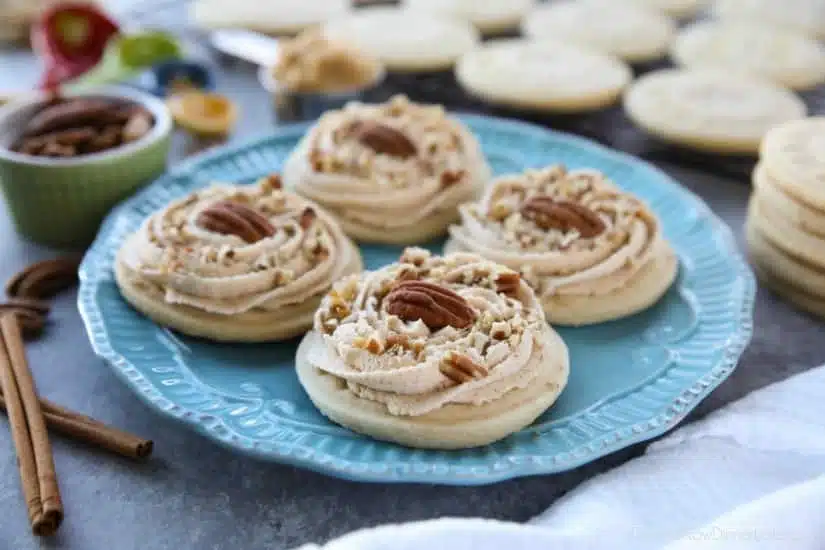 Brown Sugar Pecan Sugar Cookies are made with a classic sugar cookie base and topped with a brown sugar frosting and crunchy toasted pecans.