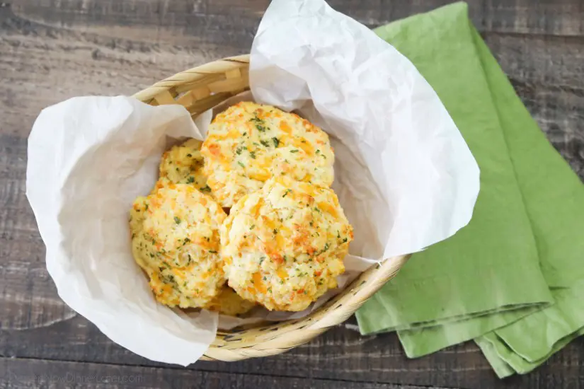 This copycat Red Lobster Cheddar Bay Biscuits recipe is super delicious! Crisp edges, a fluffy biscuit center, with plenty of cheese, garlic, and extra butter slathered on top. You won't be able to eat just one!