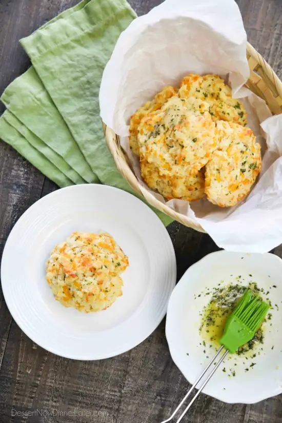 This copycat Red Lobster Cheddar Bay Biscuits recipe is super delicious! Crisp edges, a fluffy biscuit center, with plenty of cheese, garlic, and extra butter slathered on top. You won't be able to eat just one!