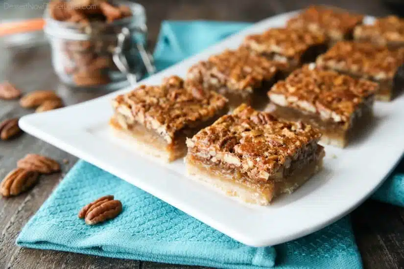 Pecan Pie Bars are made with an easy shortbread crust and delicious pecan pie filling. A crowd-pleasing Thanksgiving or Christmas dessert that will serve many guests.