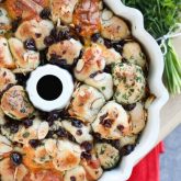 Savory Monkey Bread makes a great appetizer to share. Eat it as-is, or dip it in oil and vinegar. It's a delicious savory side to your dinner!