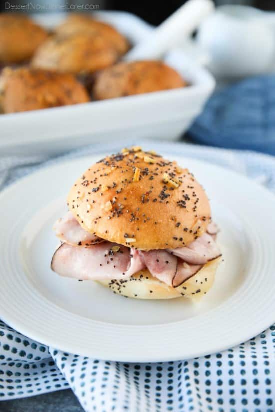 Ham and Cheese Sliders are baked in the oven with a buttery honey-mustard topping. Use leftover Christmas ham, or make them for dinner or game night. They're fast, easy, and feed a crowd!