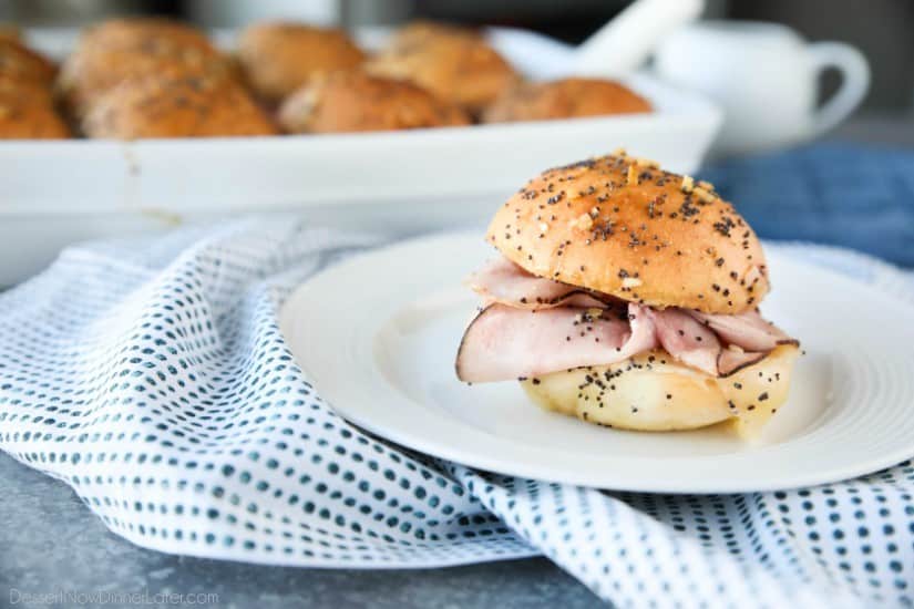 Ham and Cheese Sliders are baked in the oven with a buttery honey-mustard topping. Use leftover Christmas ham, or make them for dinner or game night. They're fast, easy, and feed a crowd!