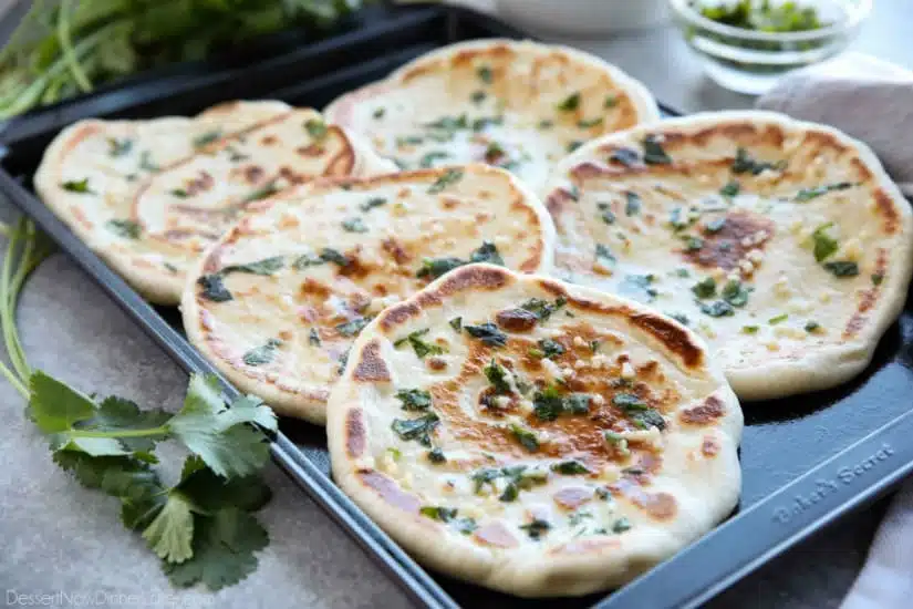 This buttery Garlic Naan flatbread is made easy with store-bought frozen dough. Enjoy restaurant-style Indian bread with dinner anytime, it's so easy!