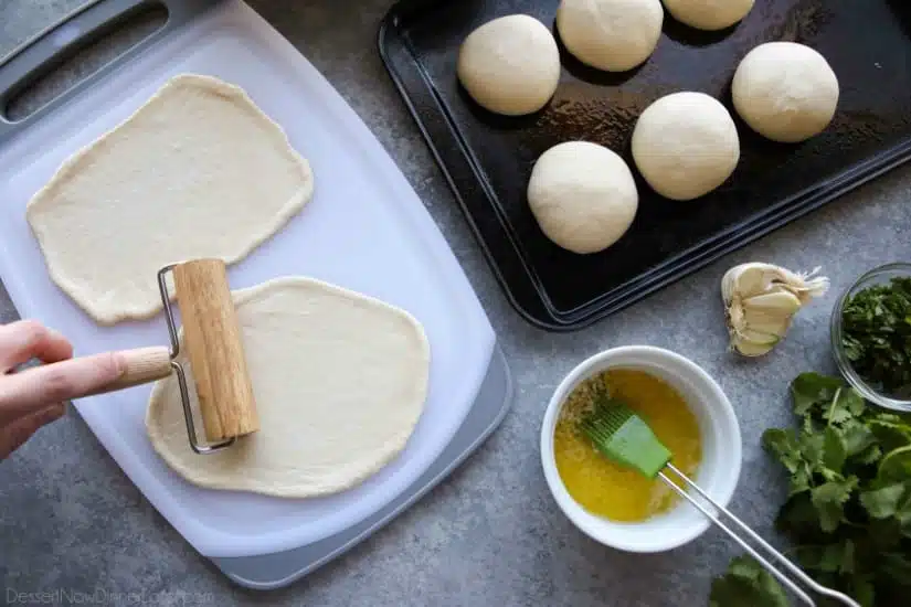 This buttery Garlic Naan flatbread is made easy with store-bought frozen dough. Enjoy restaurant-style Indian bread with dinner anytime, it's so easy!