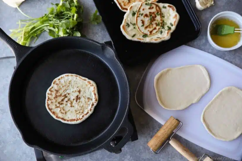 This buttery Garlic Naan flatbread is made easy with store-bought frozen dough. Enjoy restaurant-style Indian bread with dinner anytime, it's so easy!