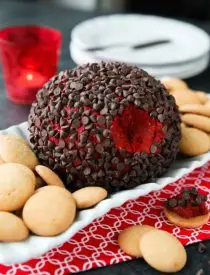 This Red Velvet Cheese Ball makes a delicious party snack or dessert. Serve it at Christmas, for Valentine's Day, or whenever. It's delicious with vanilla cookies or graham crackers.