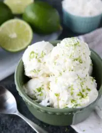 This no churn Easy Coconut Lime Ice Cream is creamy, sweet, tangy, and perfectly tropical. Add soda for an amazing ice cream float! No ice cream maker needed! (+ Recipe Video!)