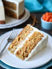 This easy carrot cake recipe is moist, perfectly-spiced, and topped with the BEST cream cheese frosting. Customize it with your favorite fillers or enjoy it simply as is.