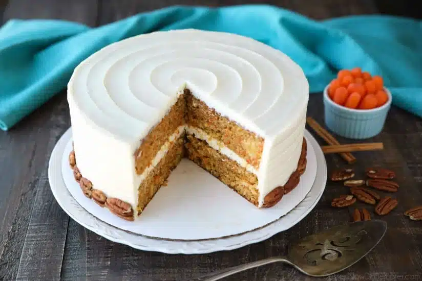 This easy carrot cake recipe is moist, perfectly-spiced, and topped with the BEST cream cheese frosting. Customize it with your favorite fillers or enjoy it simply as-is.