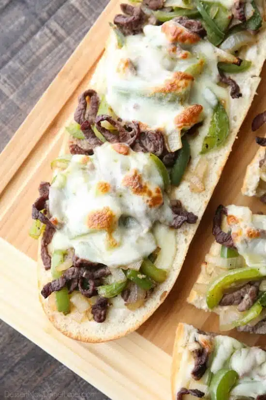 Philly Cheesesteak French Bread is a delicious open-faced sandwich with plenty of juicy meat, crisp veggies, and melty cheese for an easy dinner that is sure to satisfy!