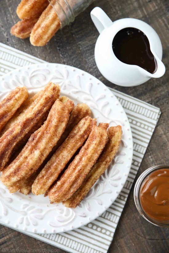 This churros recipe is super easy to make with a simple churro dough that is piped into oil and fried, then coated in cinnamon-sugar. You can enjoy these crisp, yet soft homemade churros anytime!