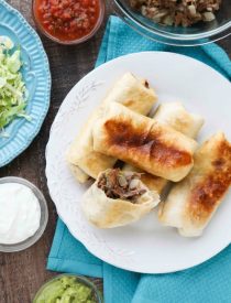 Instant Pot Chimichangas are a favorite family dinner with tender shredded beef, seasoned to perfection, and wrapped in tortillas to fry or bake. (+ Recipe Video!)