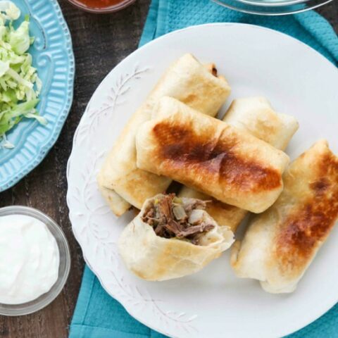 Instant Pot Chimichangas are a favorite family dinner with tender shredded beef, seasoned to perfection, and wrapped in tortillas to fry or bake. (+ Recipe Video!)