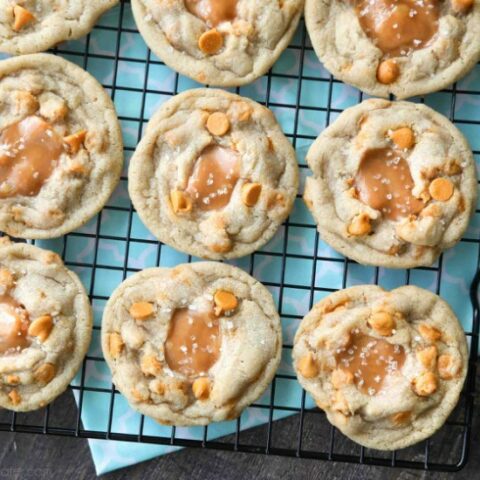 Salted Caramel Cookies are soft, chewy, and full of caramel, with just the right amount of salt. This sweet and salty dessert is one recipe you'll make again and again!