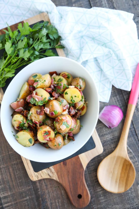 There's no mayo in this flavorful Bacon Potato Salad that's dressed with an easy garlic and honey-mustard vinaigrette. Delicious warm or cold, you'll enjoy making this zesty Bacon Potato Salad for picnics, potlucks, parties, and events!