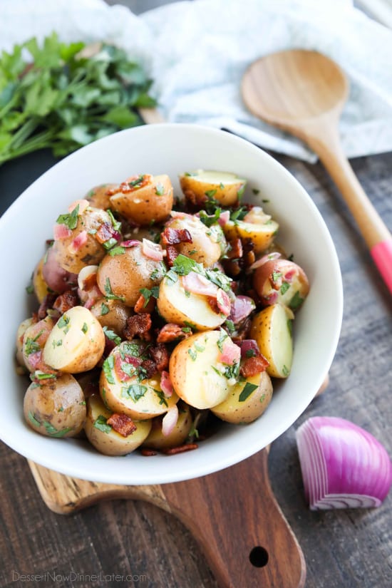 There's no mayo in this flavorful Bacon Potato Salad that's dressed with an easy garlic and honey-mustard vinaigrette. Delicious warm or cold, you'll enjoy making this zesty Bacon Potato Salad for picnics, potlucks, parties, and events!