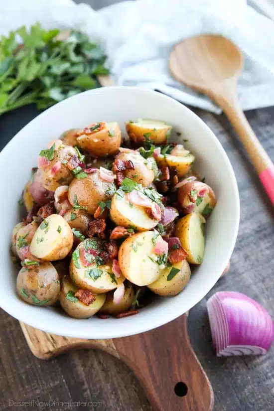 There's no mayo in this flavorful Bacon Potato Salad that's dressed with an easy garlic and honey-mustard vinaigrette. Delicious warm or cold, you'll enjoy making this zesty Bacon Potato Salad for picnics, potlucks, parties, and events!