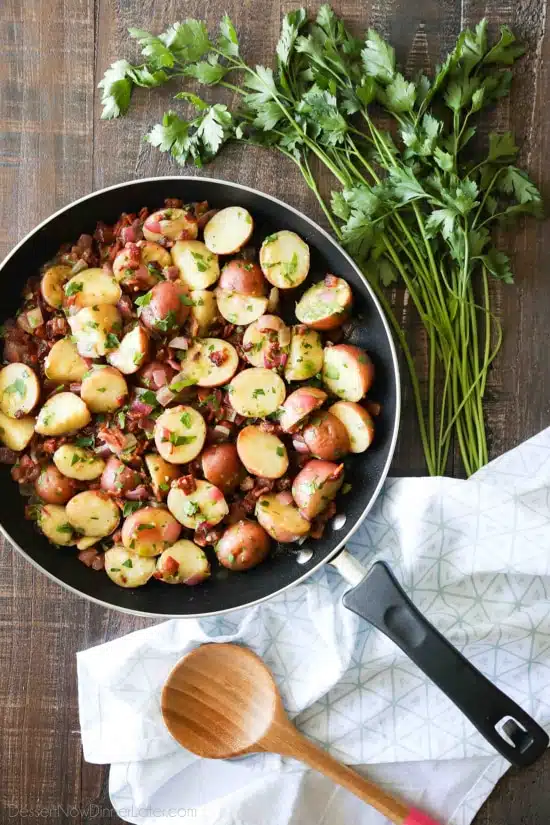 There's no mayo in this flavorful Bacon Potato Salad that's dressed with an easy garlic and honey-mustard vinaigrette. Delicious warm or cold, you'll enjoy making this zesty Bacon Potato Salad for picnics, potlucks, parties, and events!