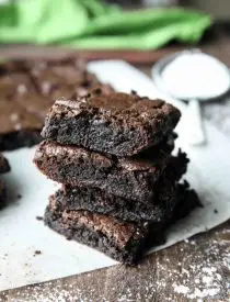 Homemade fudgy brownies are cheap and easy to make in one bowl like you would with a boxed mix from the store! Super moist and fudgy, these brownies will get eaten fast!