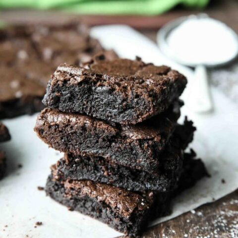 Homemade fudgy brownies are cheap and easy to make in one bowl like you would with a boxed mix from the store! Super moist and fudgy, these brownies will get eaten fast!