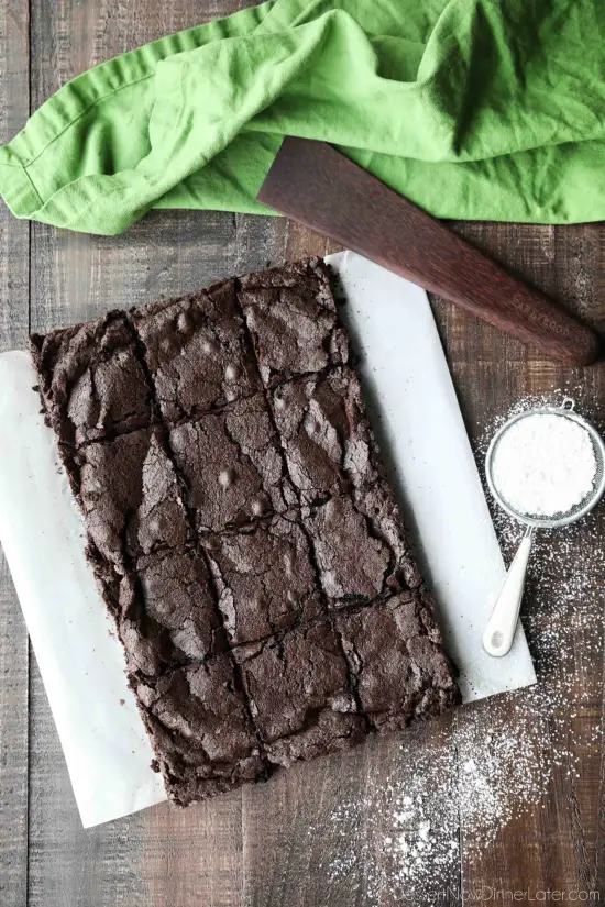 Homemade fudgy brownies are cheap and easy to make in one bowl like you would with a boxed mix from the store! Super moist and fudgy, these brownies will get eaten fast!