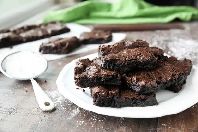 Homemade fudgy brownies are cheap and easy to make in one bowl like you would with a boxed mix from the store! Super moist and fudgy, these brownies will get eaten fast!