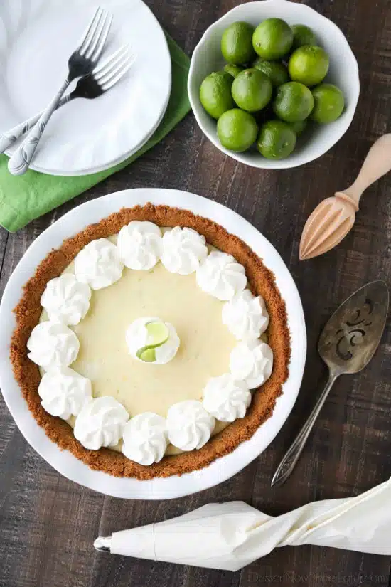 This classic Key Lime Pie recipe is smooth and creamy, tart yet sweet, and super easy to make! Top it with freshly sweetened whipped cream for the perfect bite!