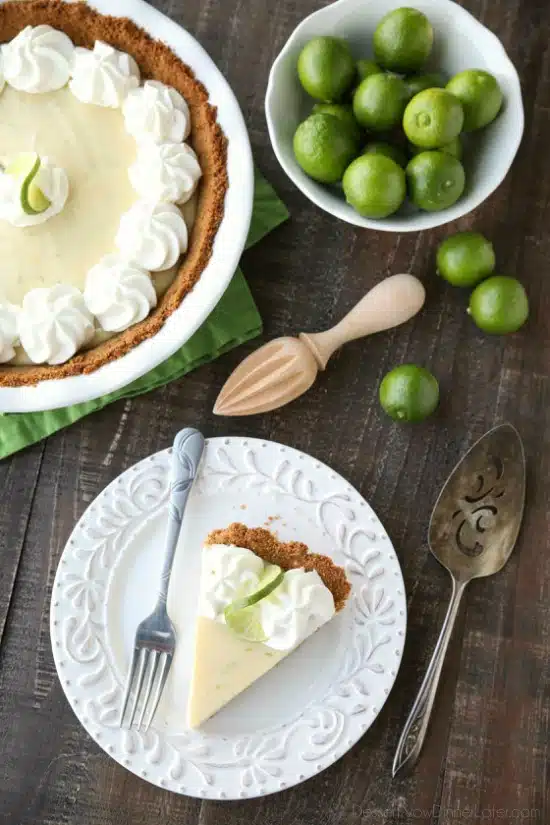 This classic Key Lime Pie recipe is smooth and creamy, tart yet sweet, and super easy to make! Top it with freshly sweetened whipped cream for the perfect bite!