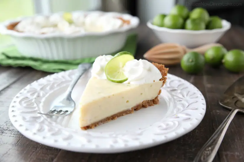 This classic Key Lime Pie recipe is smooth and creamy, tart yet sweet, and super easy to make! Top it with freshly sweetened whipped cream for the perfect bite!