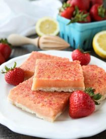 Strawberry Lemonade Bars combine fresh, ripe strawberries with classic lemon bars for a delicious sweet and tangy summer dessert.