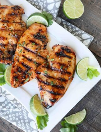 This Chipotle Chicken is marinated in a bold, sweet and spicy mixture with tasty herbs and spices, creating juicy, flavorful grilled chicken. Our absolute favorite chicken marinade!