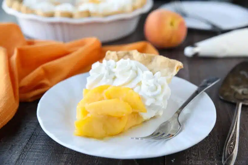 This Fresh Peach Pie has a no-bake filling that uses fresh, uncooked peaches and a simple homemade glaze inside of a crisp pie crust. A great recipe for fresh peaches!