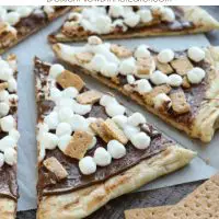 Make your dessert outside! This Grilled S'mores Pizza is an easy and delicious dessert with all the flavors of everyone's favorite campfire treat! 