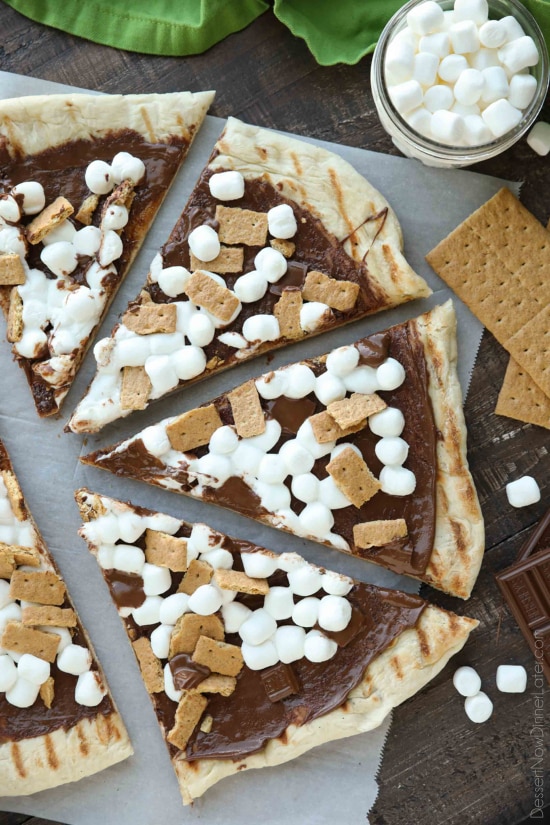 Make your dessert outside! This Grilled S'mores Pizza is an easy and delicious dessert with all the flavors of everyone's favorite campfire treat! 