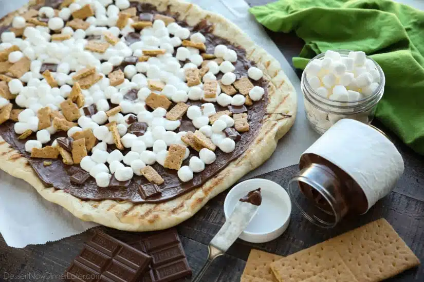 Make your dessert outside! This Grilled S'mores Pizza is an easy and delicious dessert with all the flavors of everyone's favorite campfire treat! 