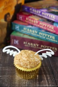 You don't need to be a professional cake decorator to make these super easy Golden Snitch Cupcakes for your Harry Potter Birthday Party! (+More Harry Potter Party Ideas!)