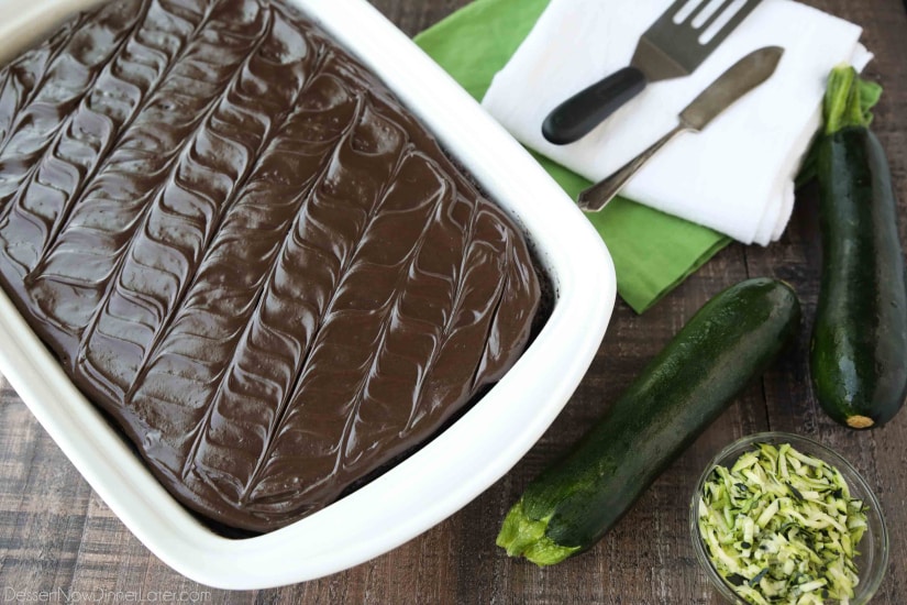 Chocolate Zucchini Cake is rich and moist, and topped with a decadent chocolate frosting. You'd never know there was zucchini hidden in this easy and delicious chocolate cake!