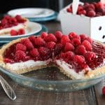 Raspberry Cream Pie has layers of no-bake cheesecake and an easy raspberry pie filling inside of a vanilla wafer crust. It's not too sweet, not too tart, is perfectly light and satisfying, and can be made year round with fresh or frozen raspberries. 