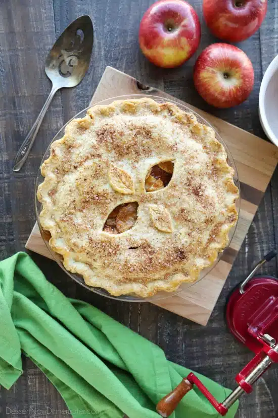 This homemade apple pie recipe has a flaky pie crust with cinnamon-sugar sprinkled on top and an extra fruity apple pie filling with just the right amount of sauce.