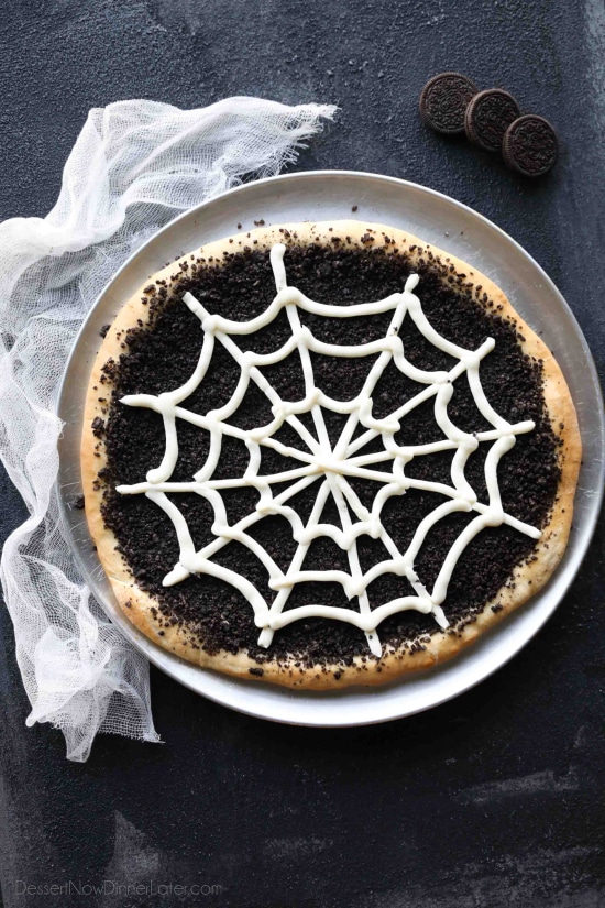 This Cobweb Oreo Dessert Pizza is an easy and fun Halloween party food that will be enjoyed by guests of all ages.